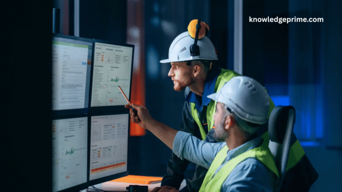 Team analyzing safety data on EHS software dashboard for workplace compliance and performance